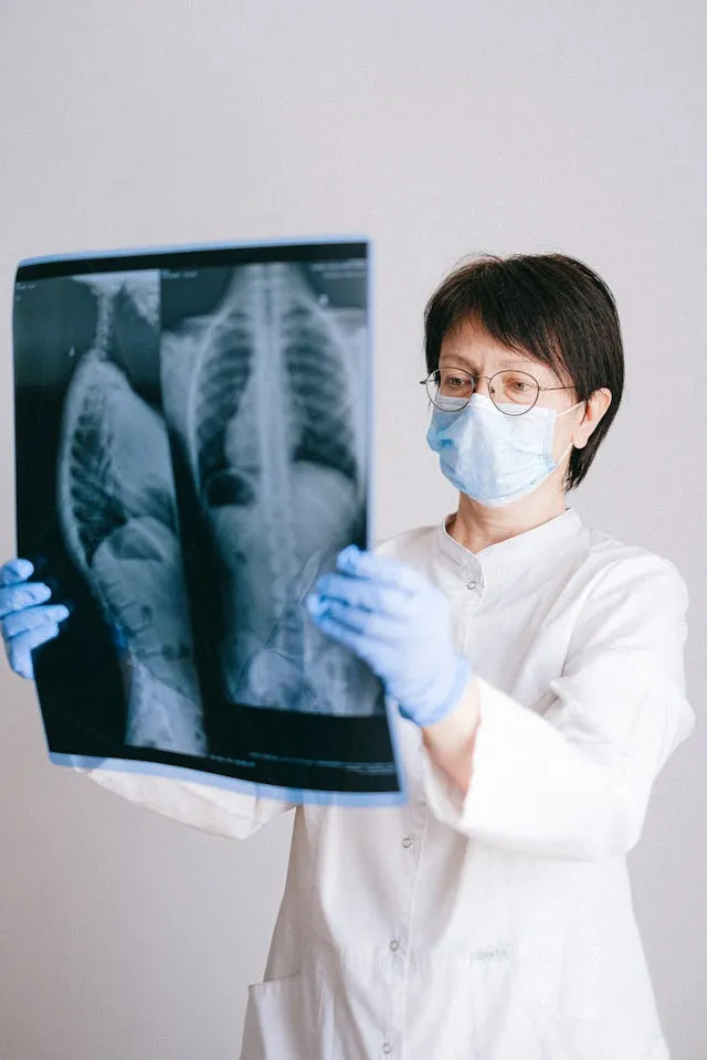 doctor examining x-ray