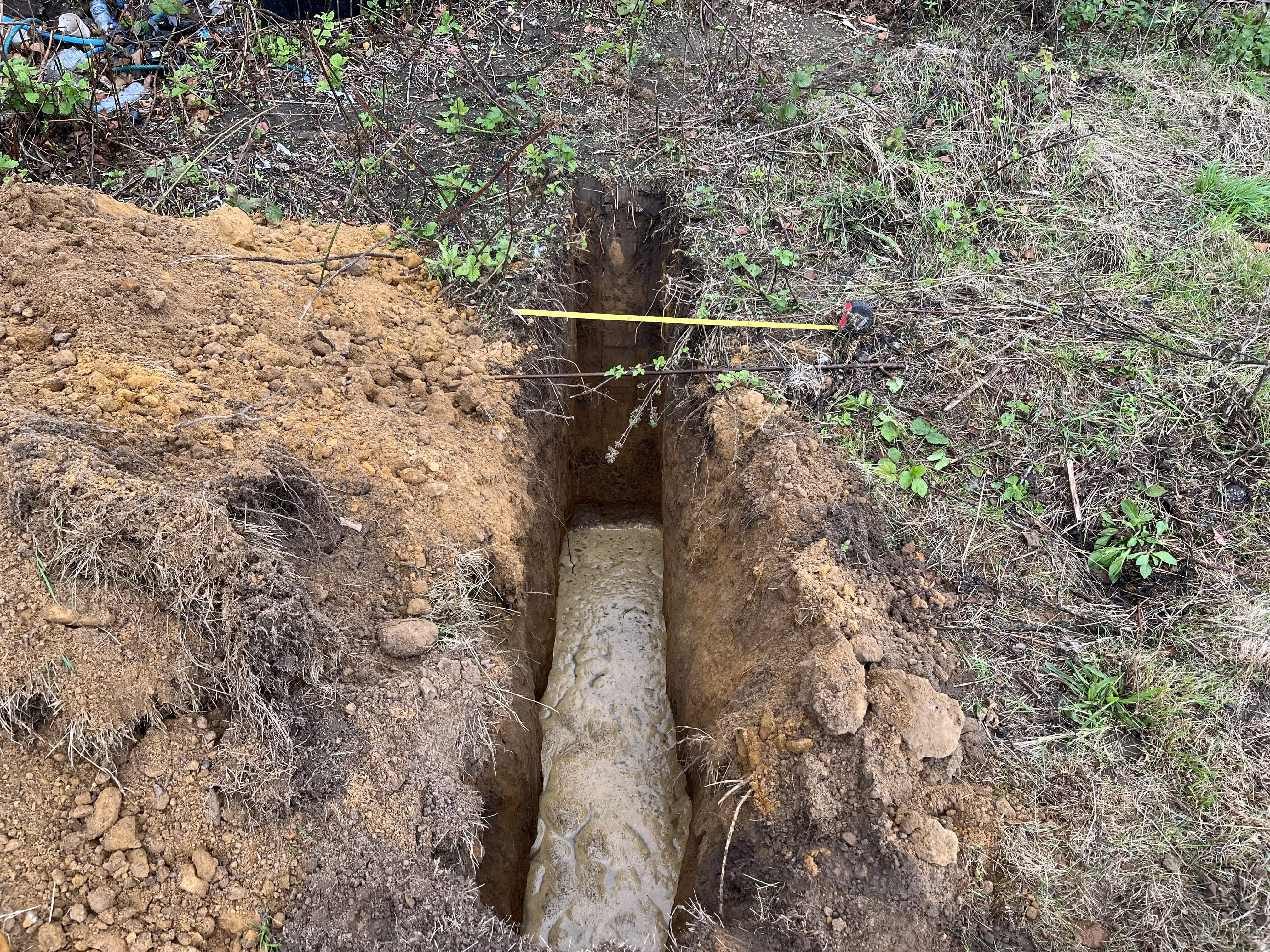 Trial pit used for infiltration testing and groundwater observation in Kent