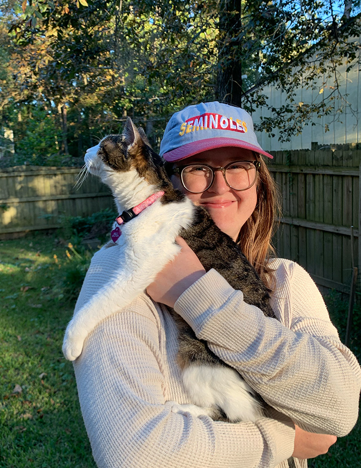 Photo of Alexa holding her cat, Shelly