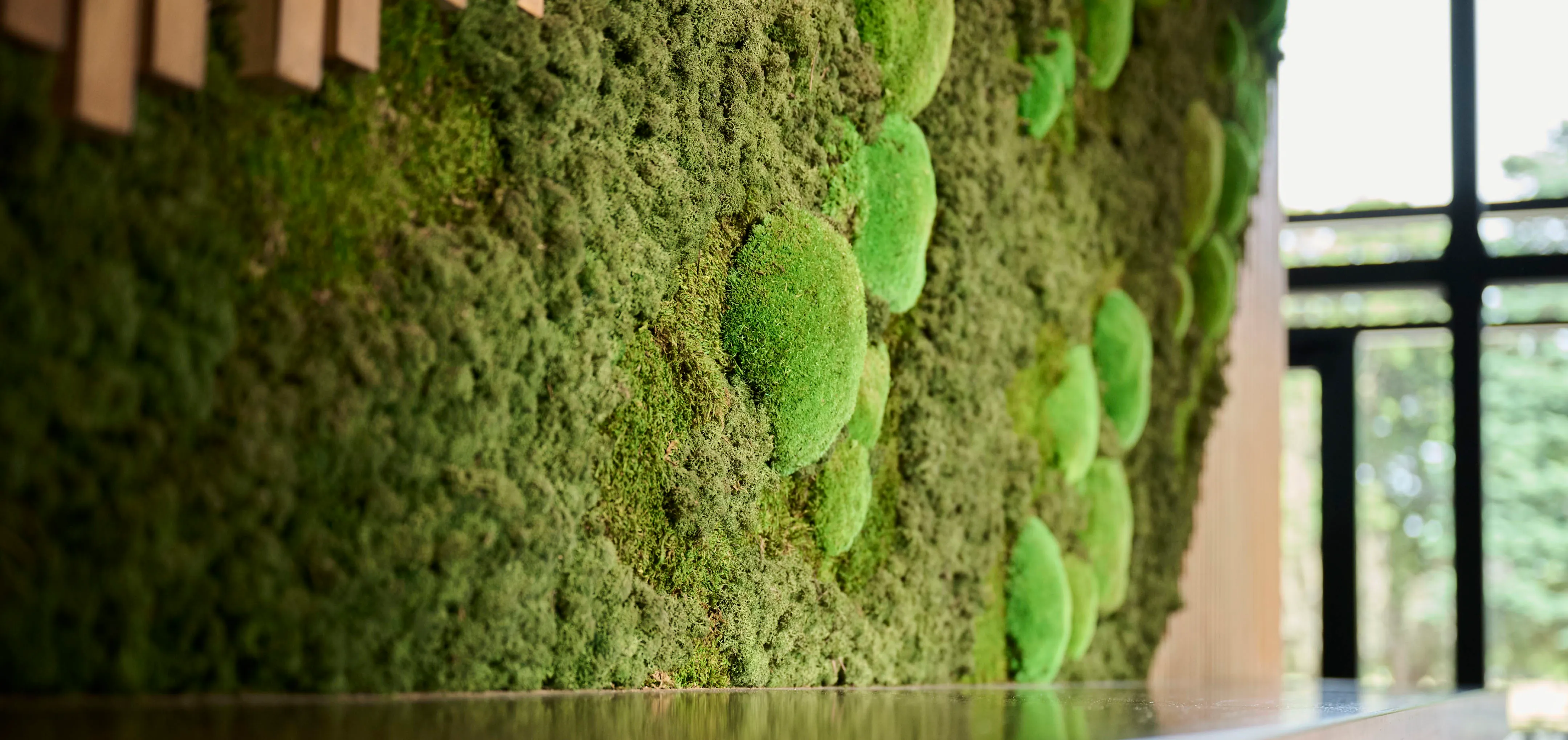 Bespoke greenery for Home NZ creates a highly memorable aesthetic that’s inspired by the client’s construction background.