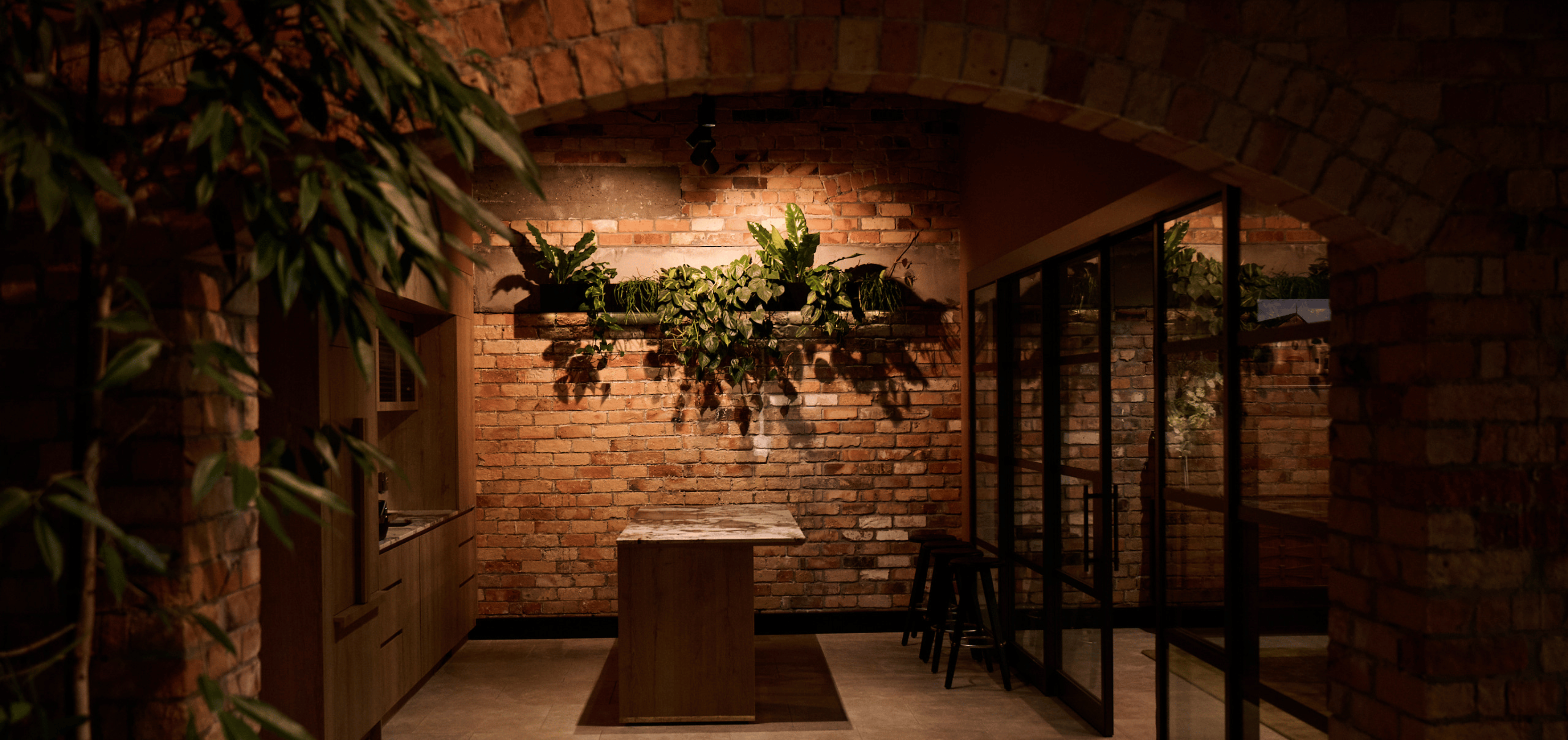 Greenery that softens heritage architecture, creating warmth and intimacy within Gold Merchants.
