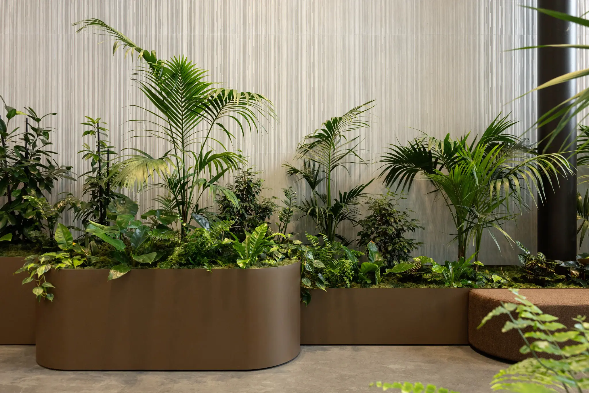 In built planter seat with lush greenery