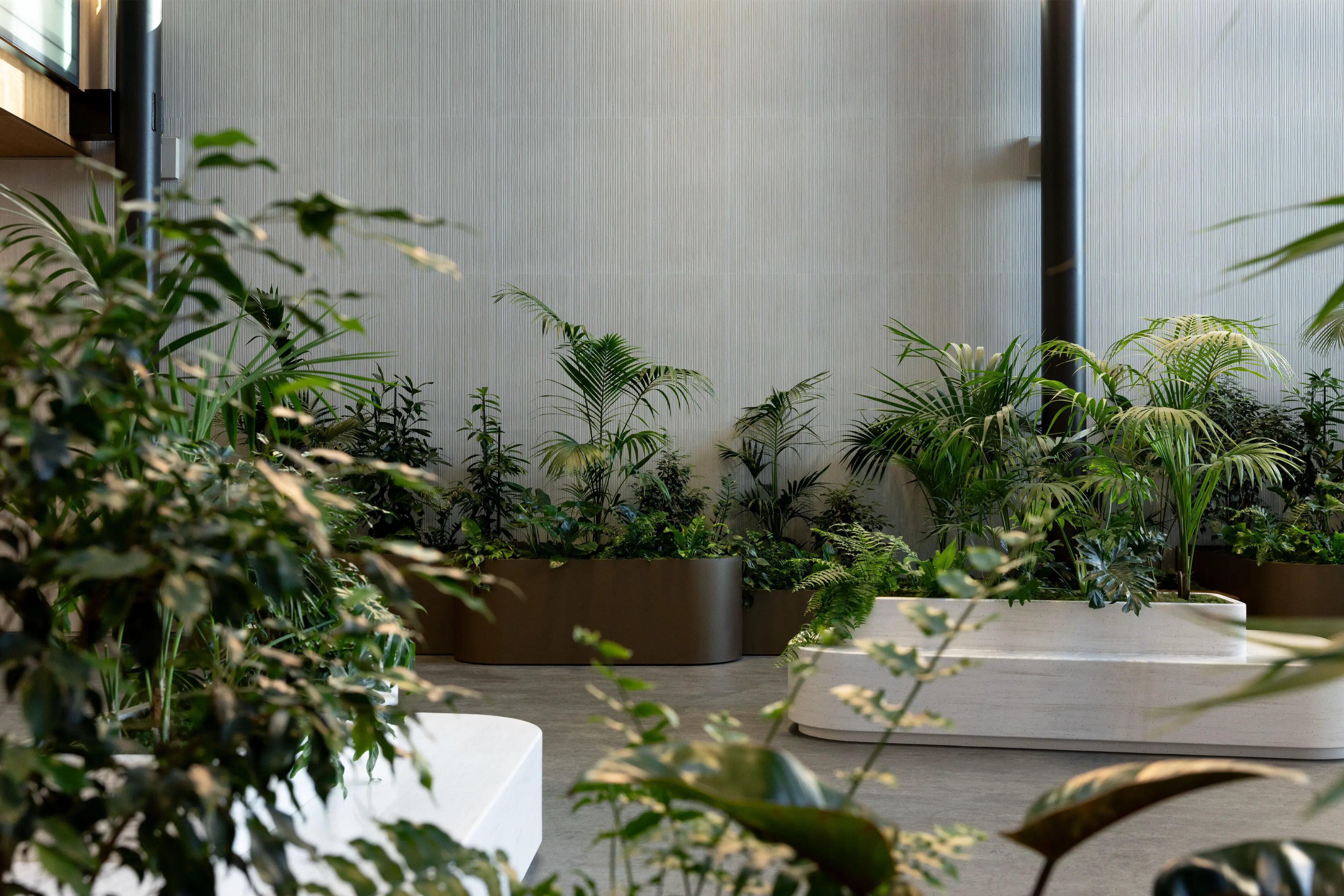 In built planter seat with lush greenery