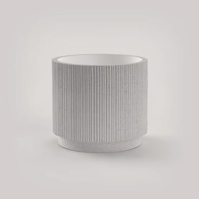 Ripple planter with vertical fluting in a soft stone finish