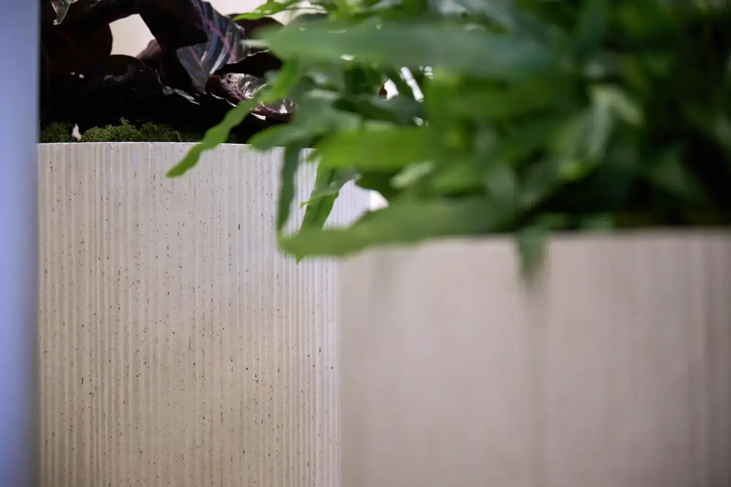 Close-up of the fluted texture of a Ripple planter