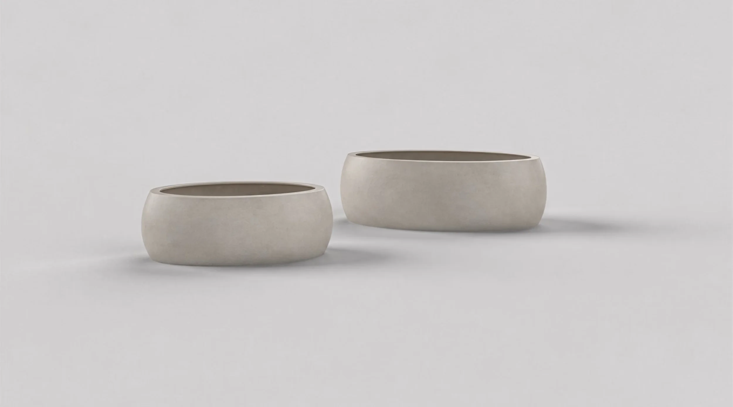 Two Drift low oval planters in different sizes