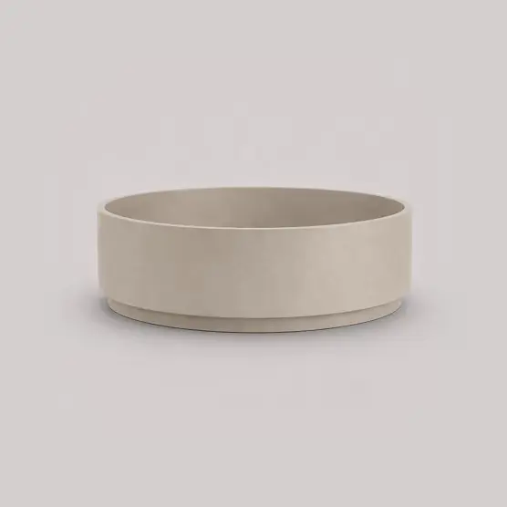 Plinth low circular planter with a floating base