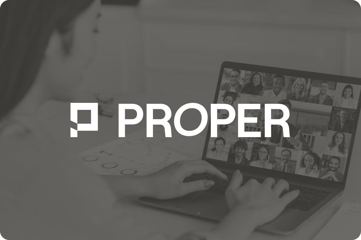 Person typing on a laptop with a video conference screen showing multiple participants' faces, with the word PROPER and a square logo overlaying the image.