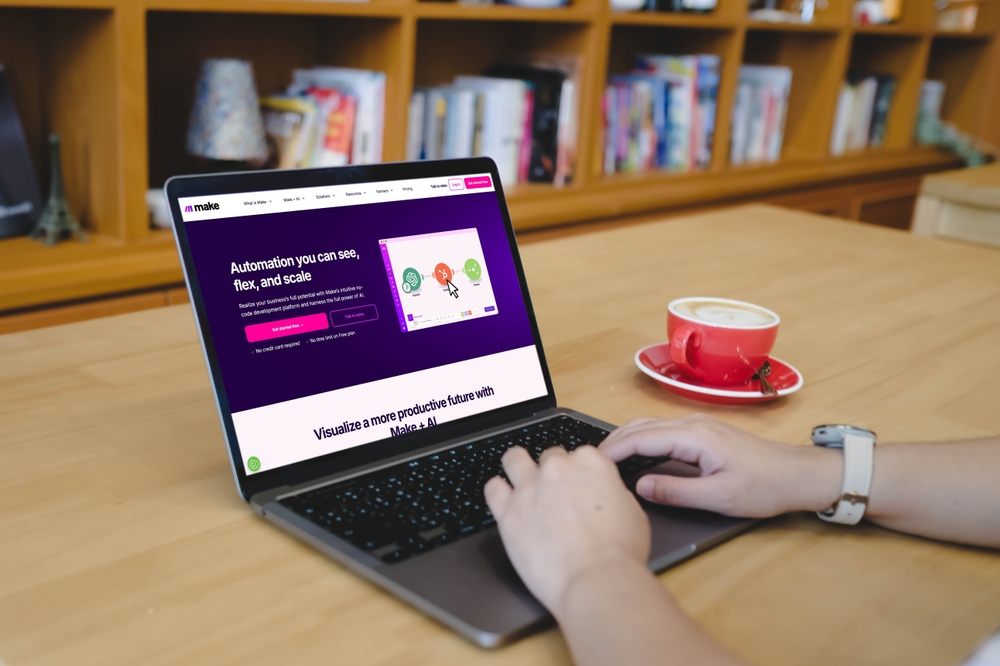 a man on the make.com website on his computer