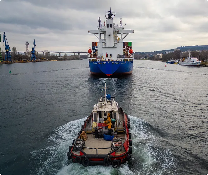 Large and small vessels towing each other