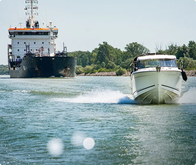 A large ship and a small vessel