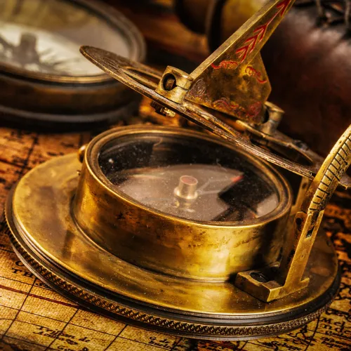 Close up of a golden compass