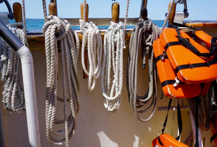 Ropes and personal floatation device on a ship