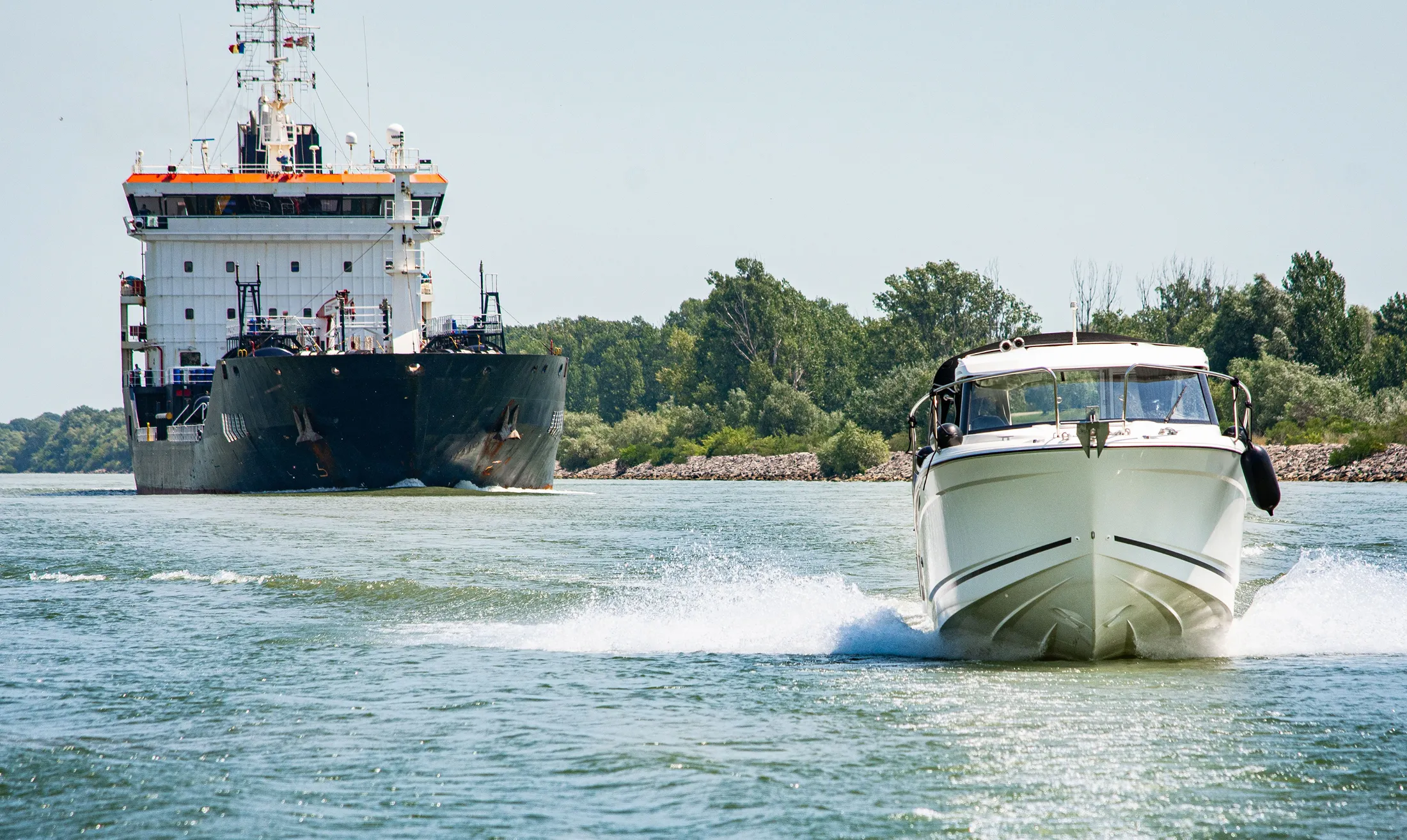 A large ship and a small vessel