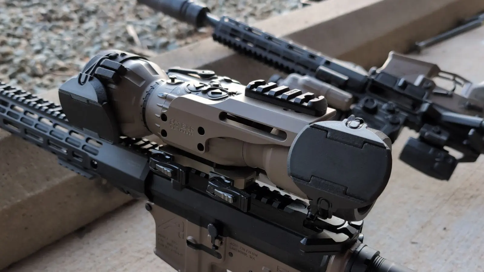Tactical riflescope bumper and magnification control by Scope Bumper