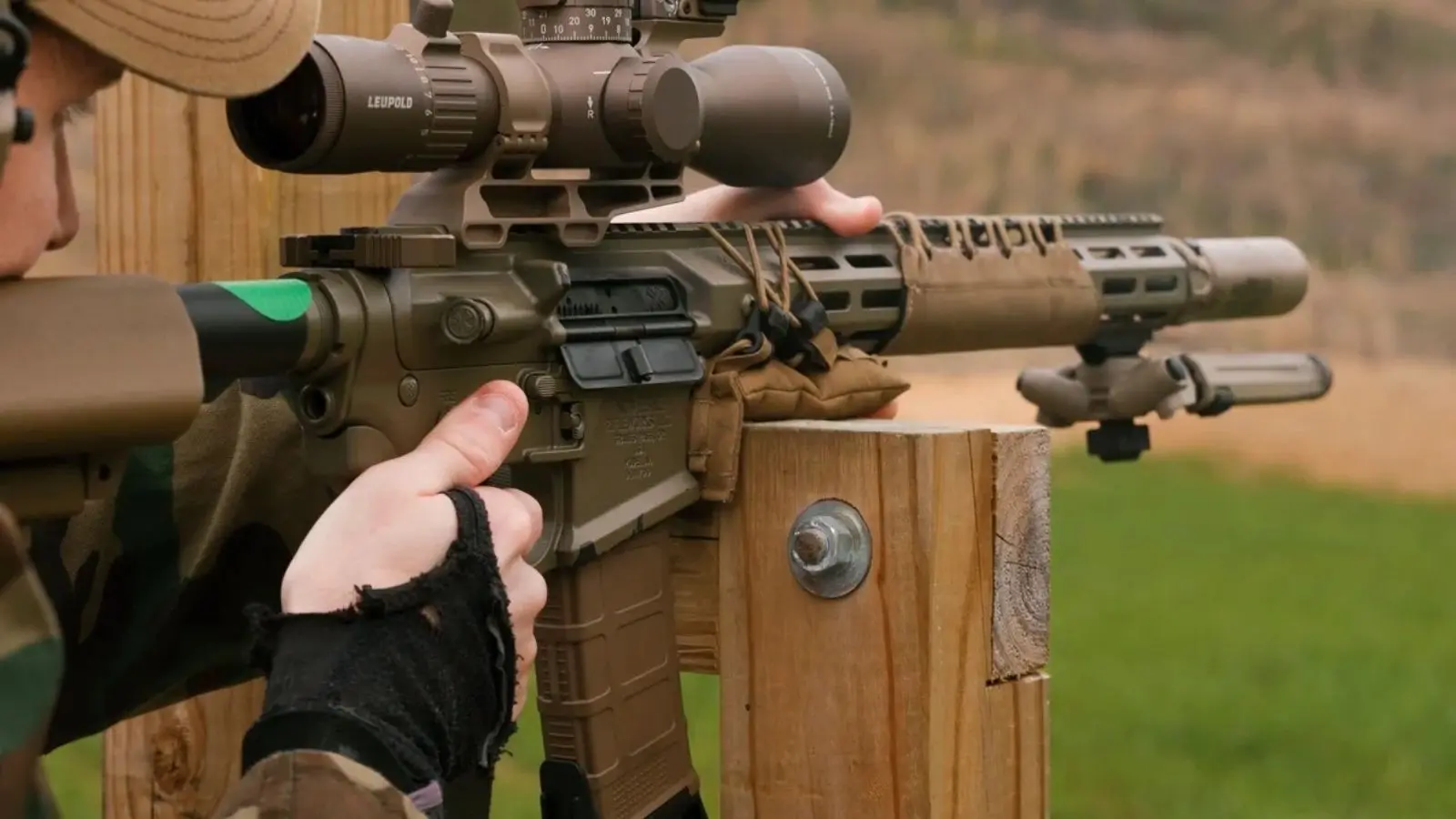 Precision rifle with Streamline Barricade Bag mounted for stable barricade shooting