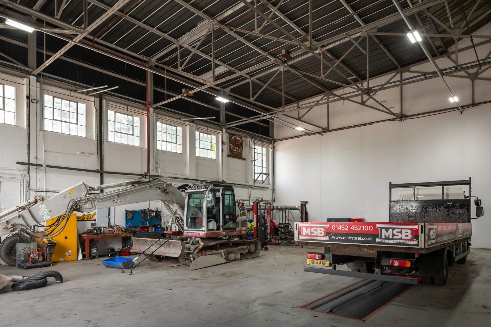 Site excavation and groundworks preparation for a steel-framed building