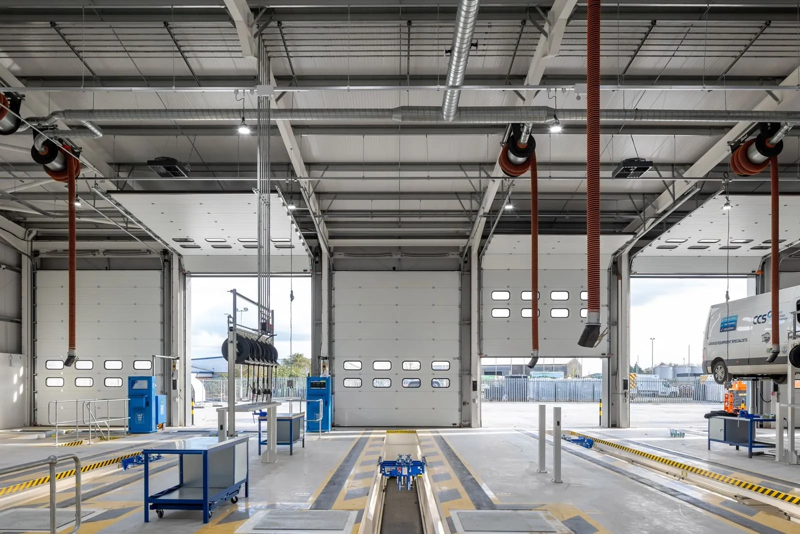 Sectional and high-speed industrial doors installed on a commercial unit