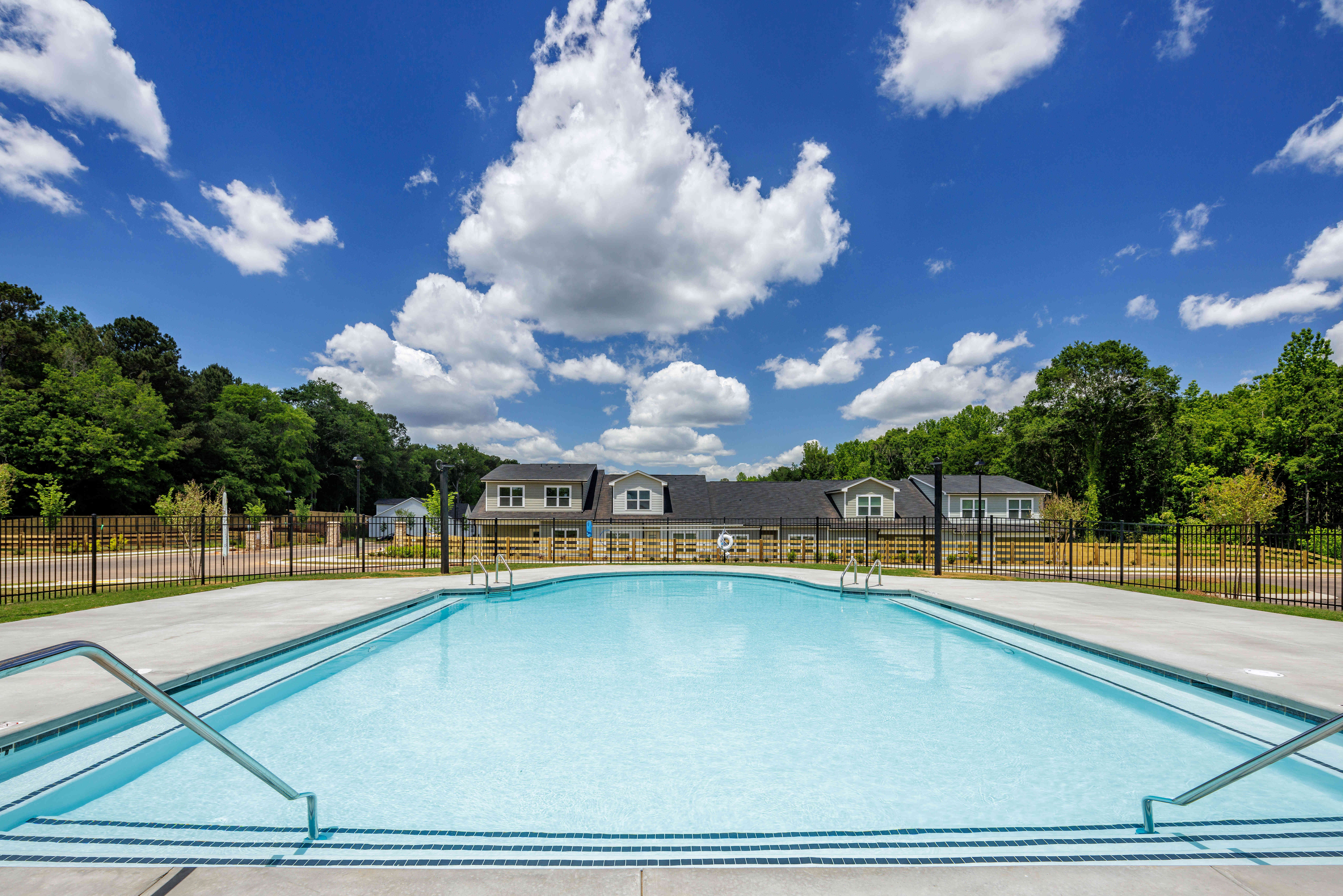 resort style pool view from behind the clubhouse