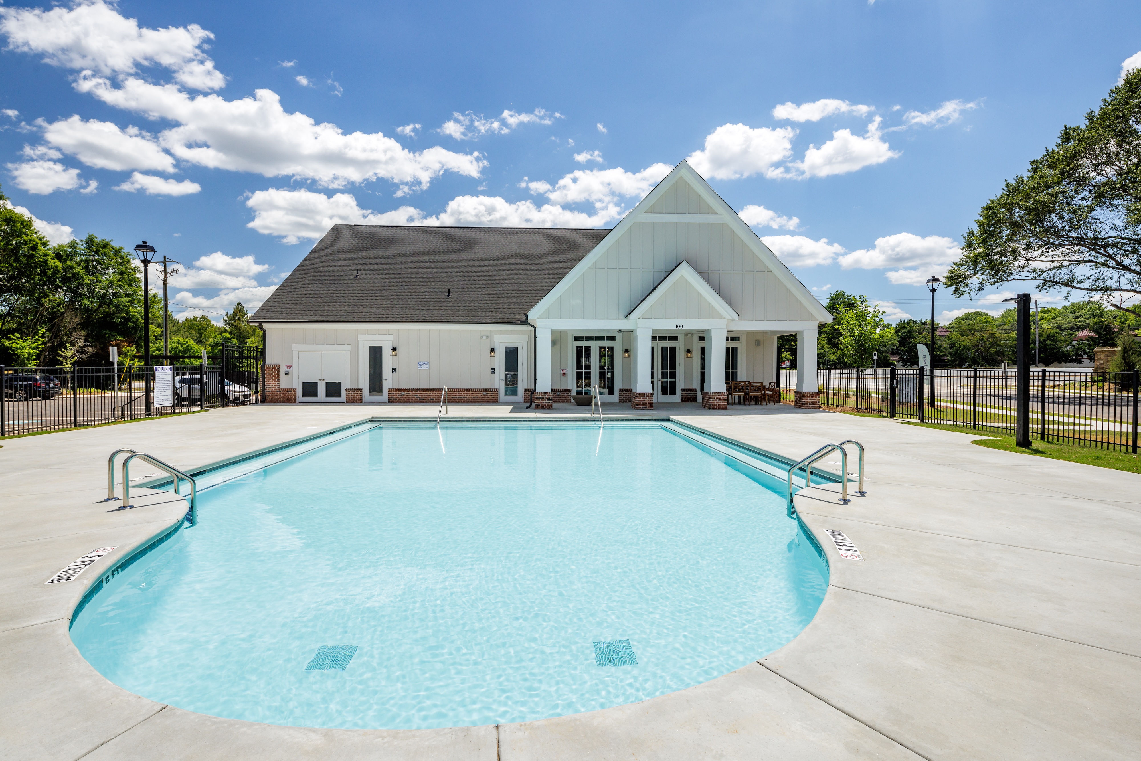 Pool with deck around it
