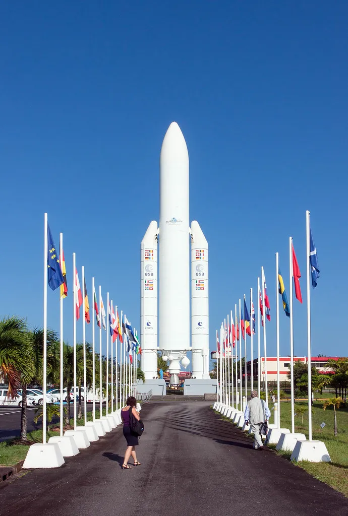 A6 rocket in the middle and country flags in the side