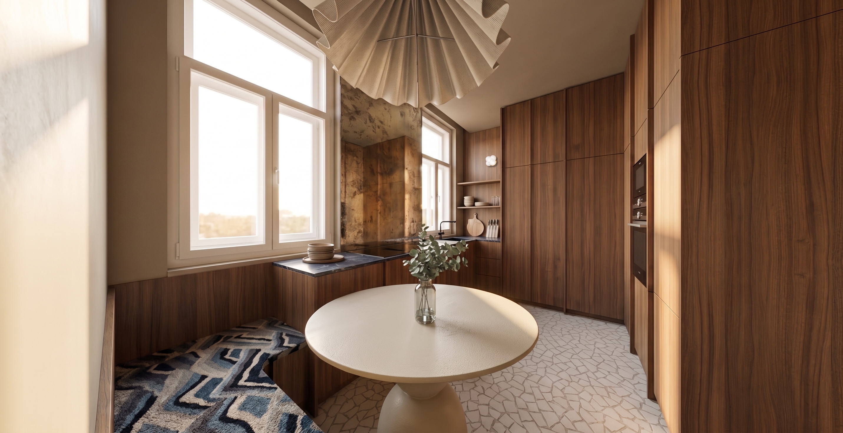 Cuisine et coin repas d'un petit appartement à Lille : menuiserie en noyer, table ronde à piètement central et suspension plissée.