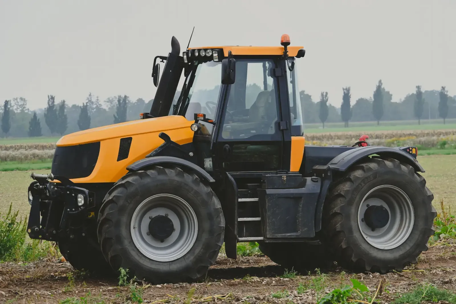 Tractor at work in an open field