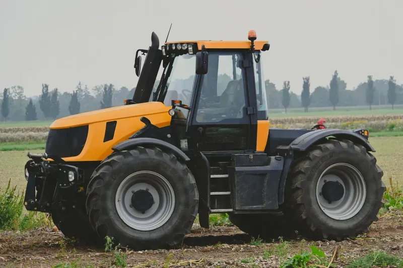 Tractor working an open field