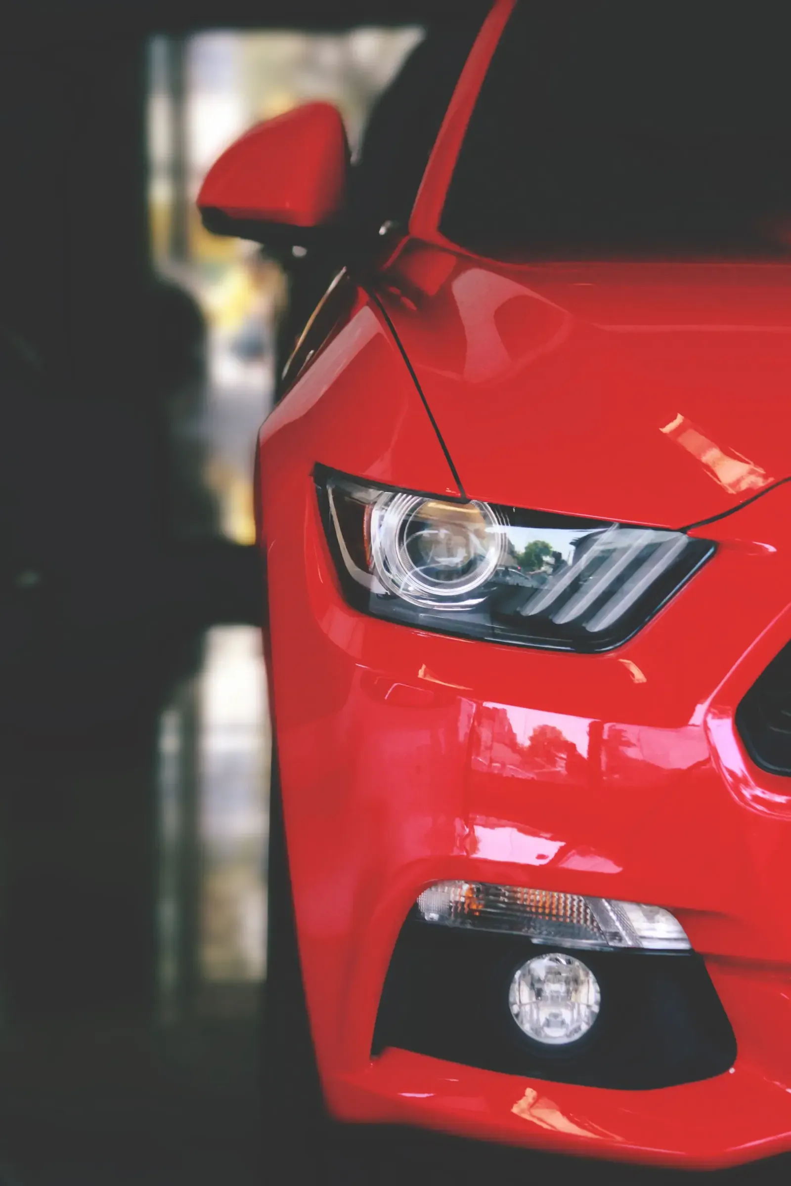 Close detail of a new vehicle on a showroom floor
