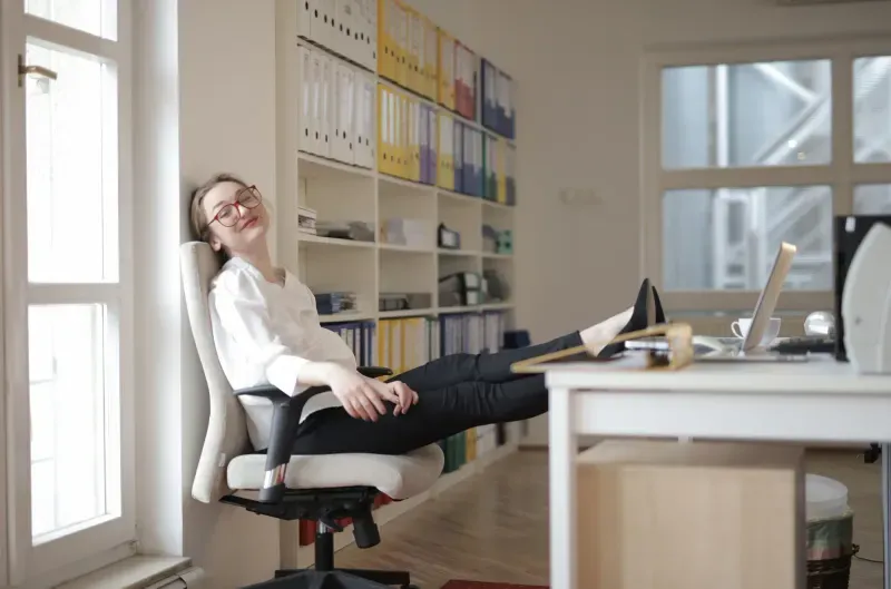 Someone taking a moment at their desk in a quiet office