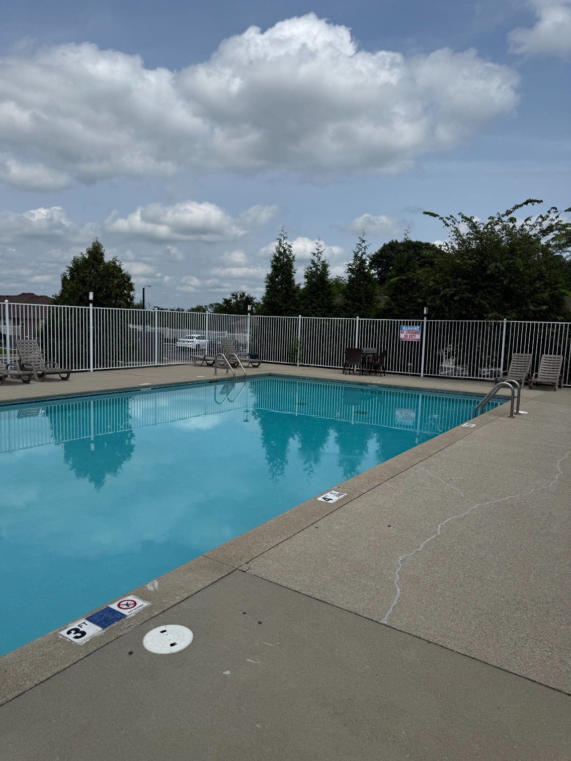 Swimming pool with lounge chairs