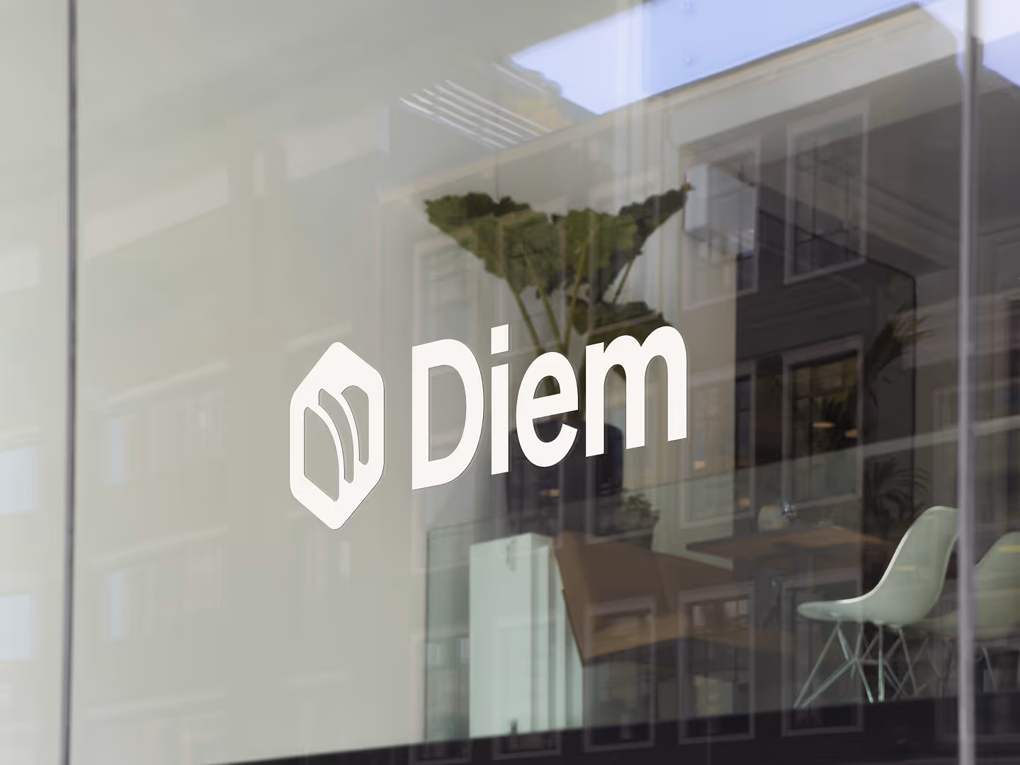 Tech startup company logo mockup on an office forefront glass.