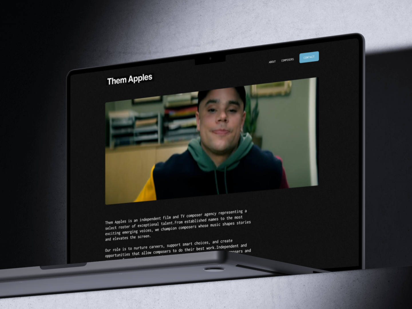 Dark grainy website for a composer managment company Them Apples.