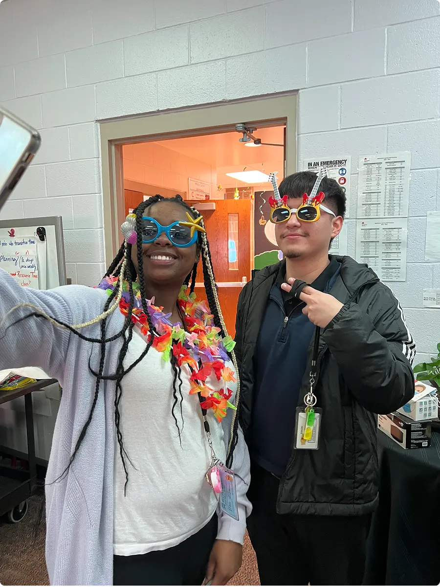 A couple of people that are posing for a picture.