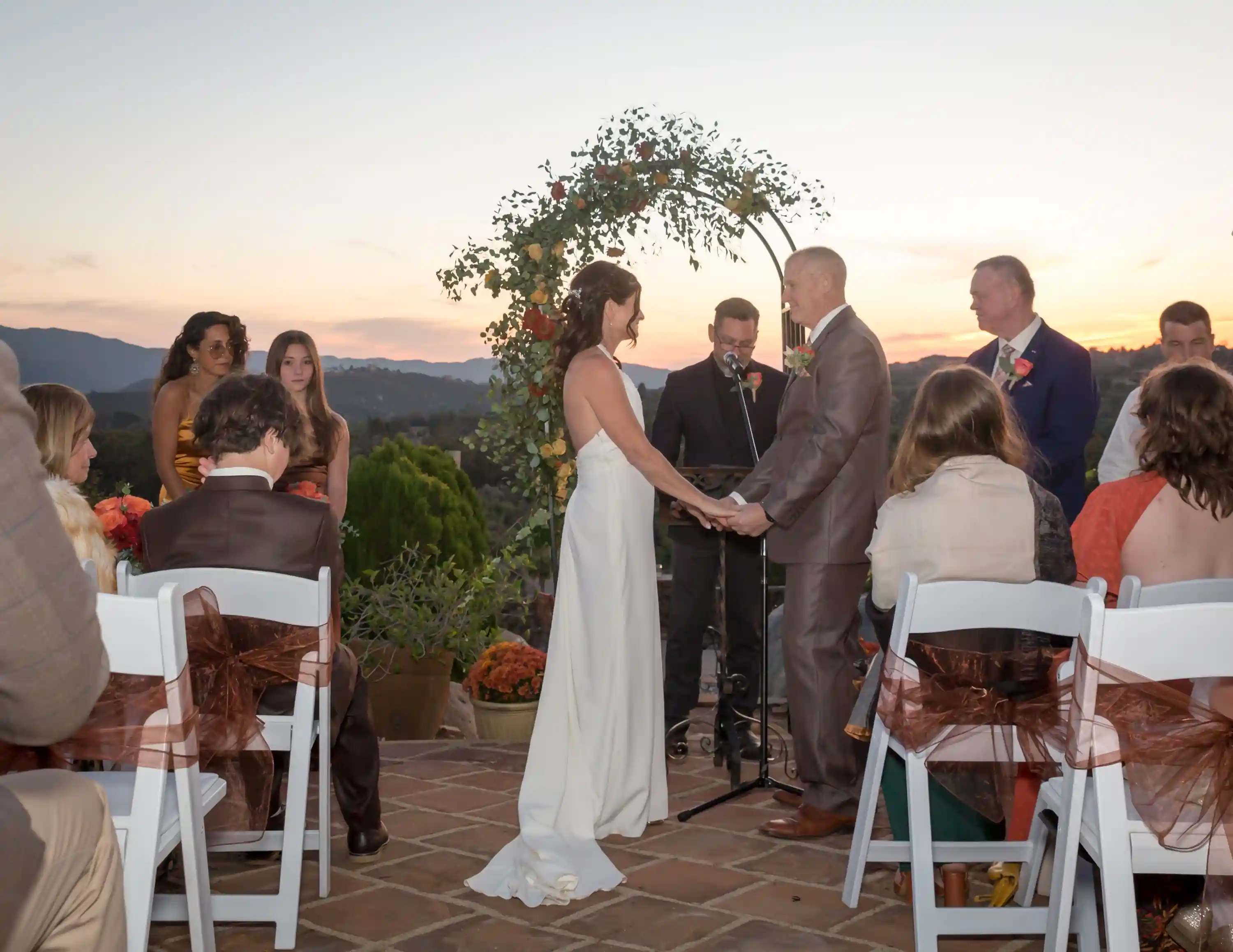 Bride groom pastor sunset view