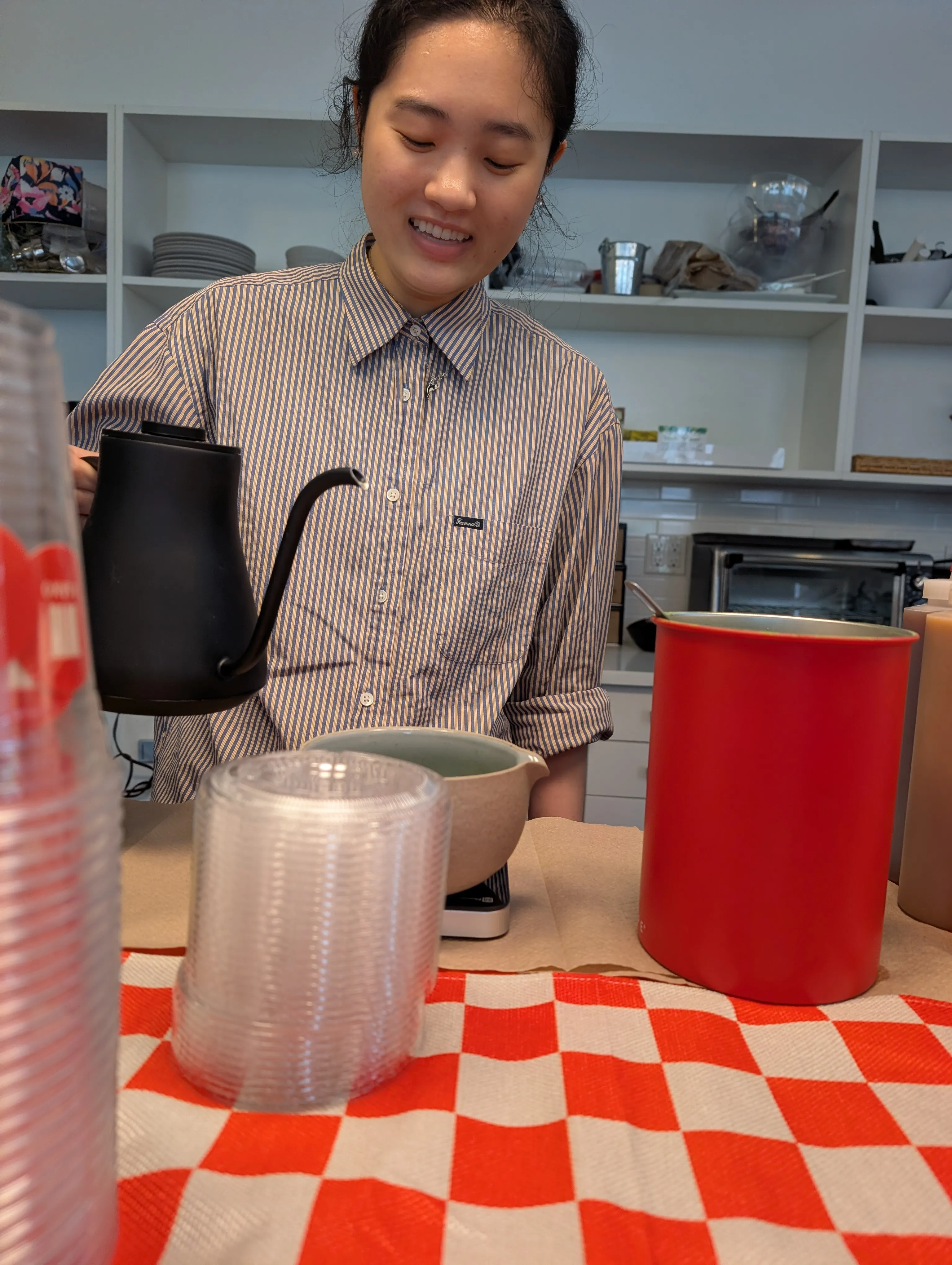 ASANO barista whisking matcha at a matcha bar event