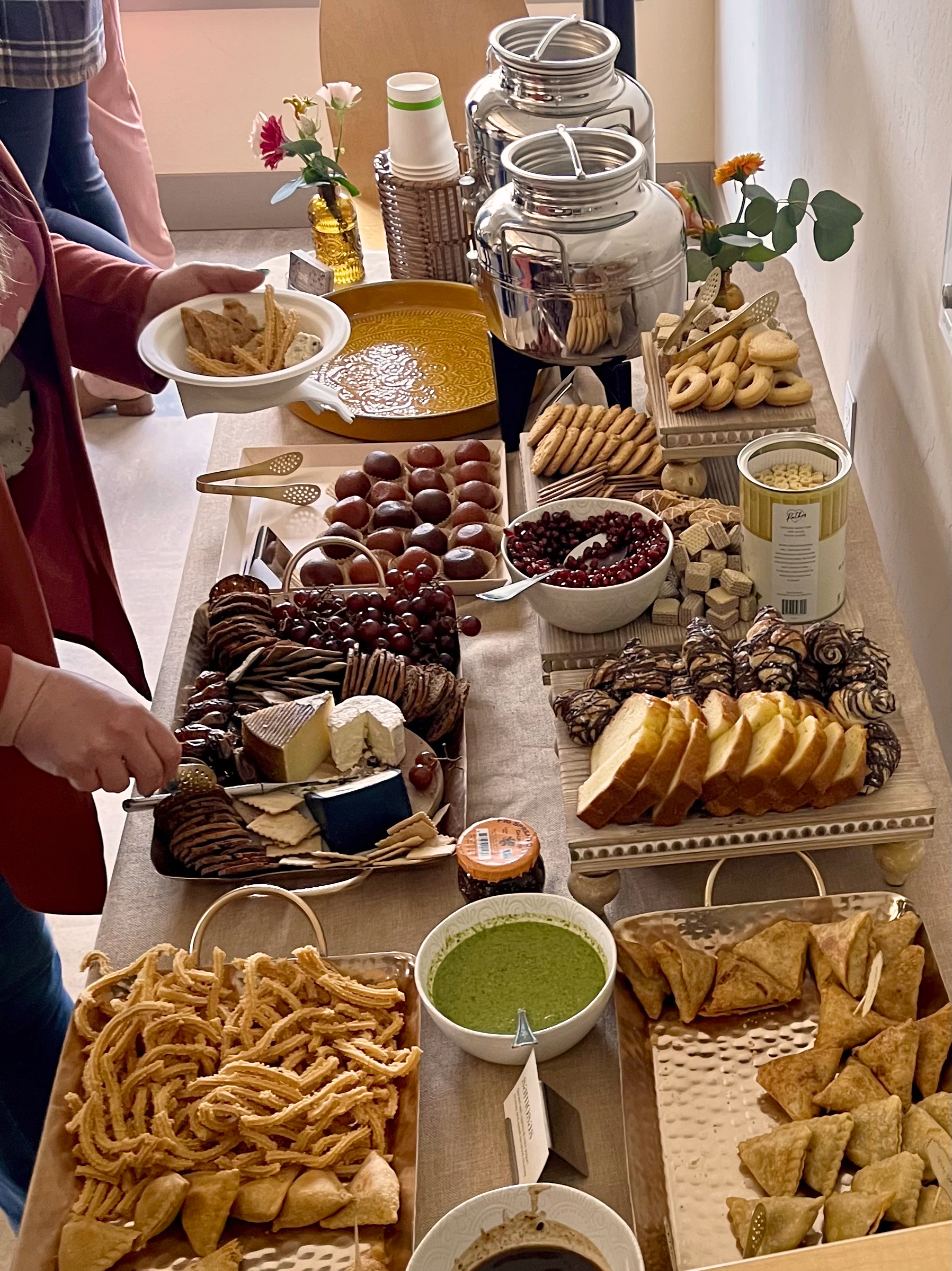 Asli chai catering table with chai-cuterie snack spread