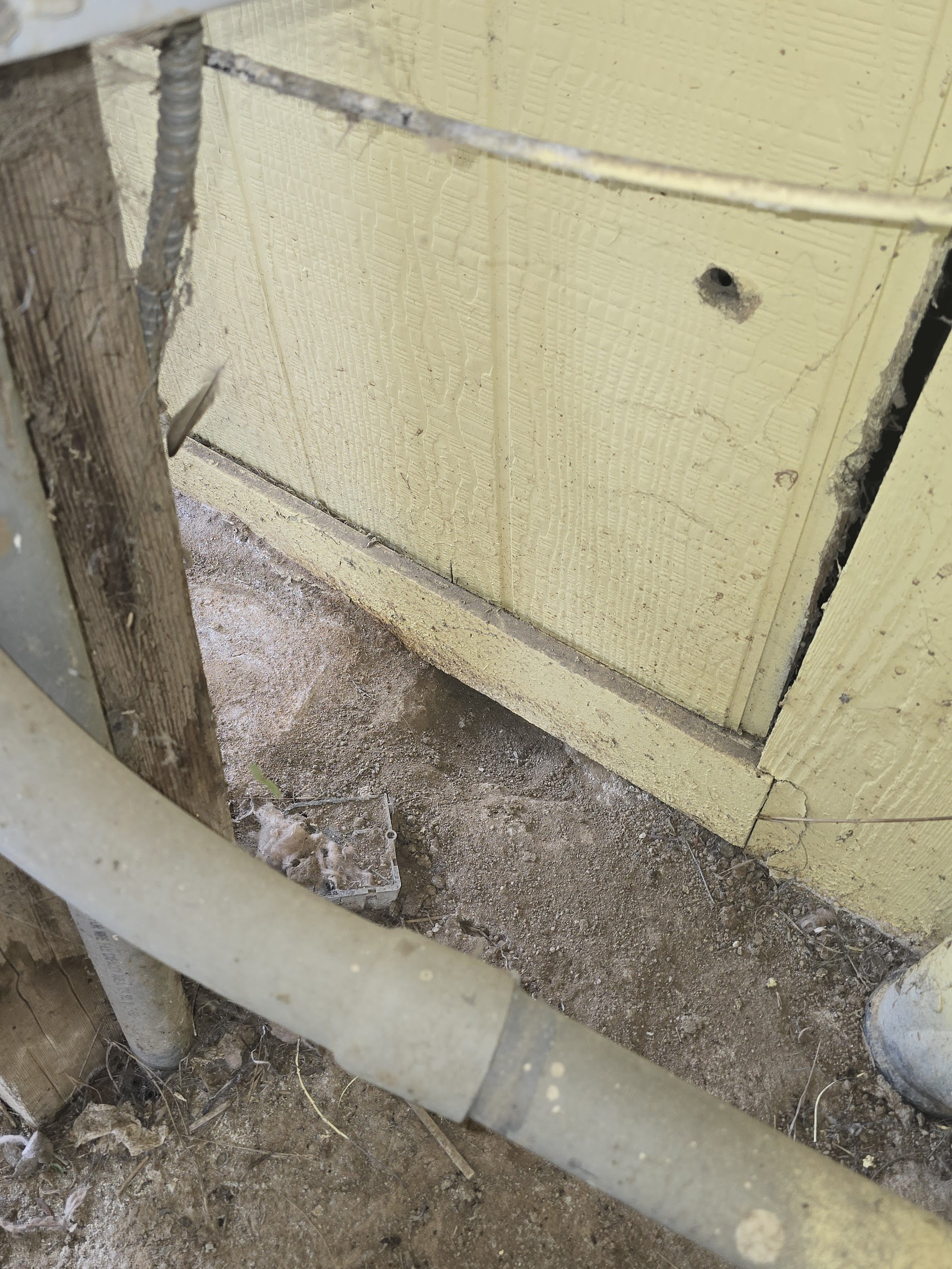 Gopher removal service in Temecula CA with visible tunnel damage near home