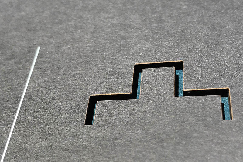 výsek laserem a spodní kašír