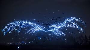 Drone show display in the night sky, featuring multiple drones creating complex light patterns.