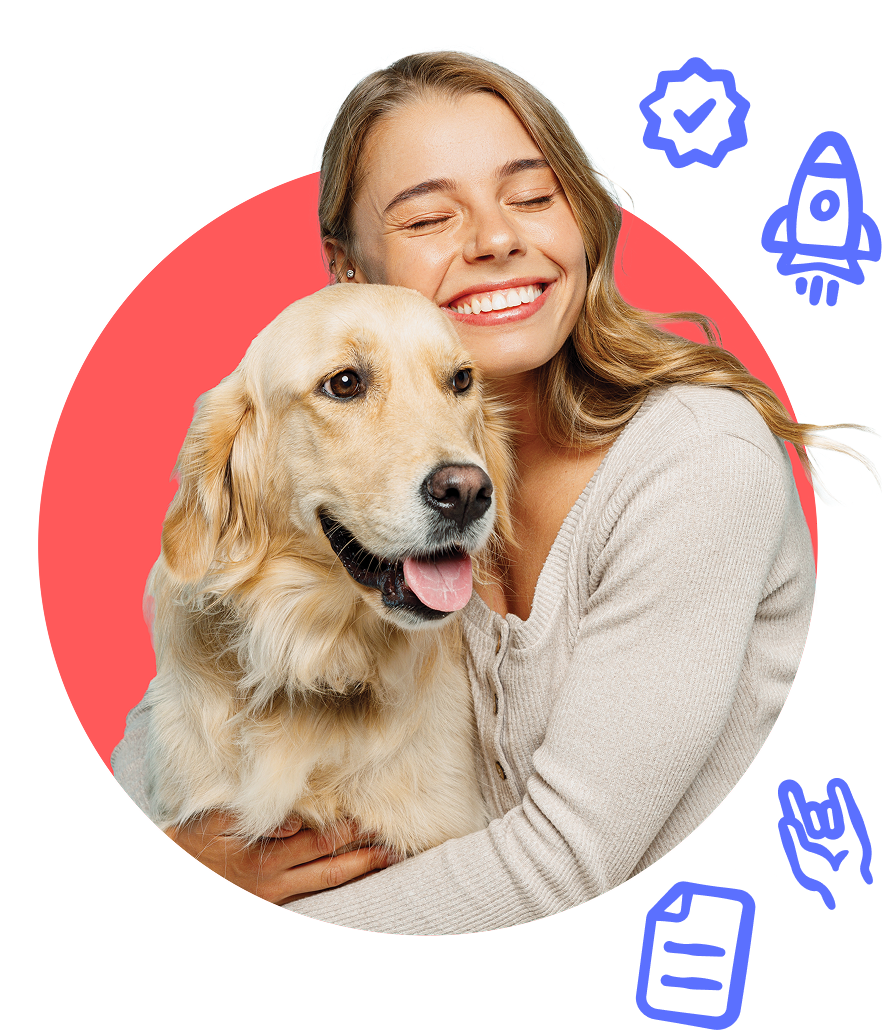 A blonde woman holding a Golden Retriever