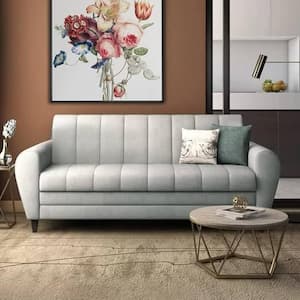 Brown leather sofa in a bright modern living room