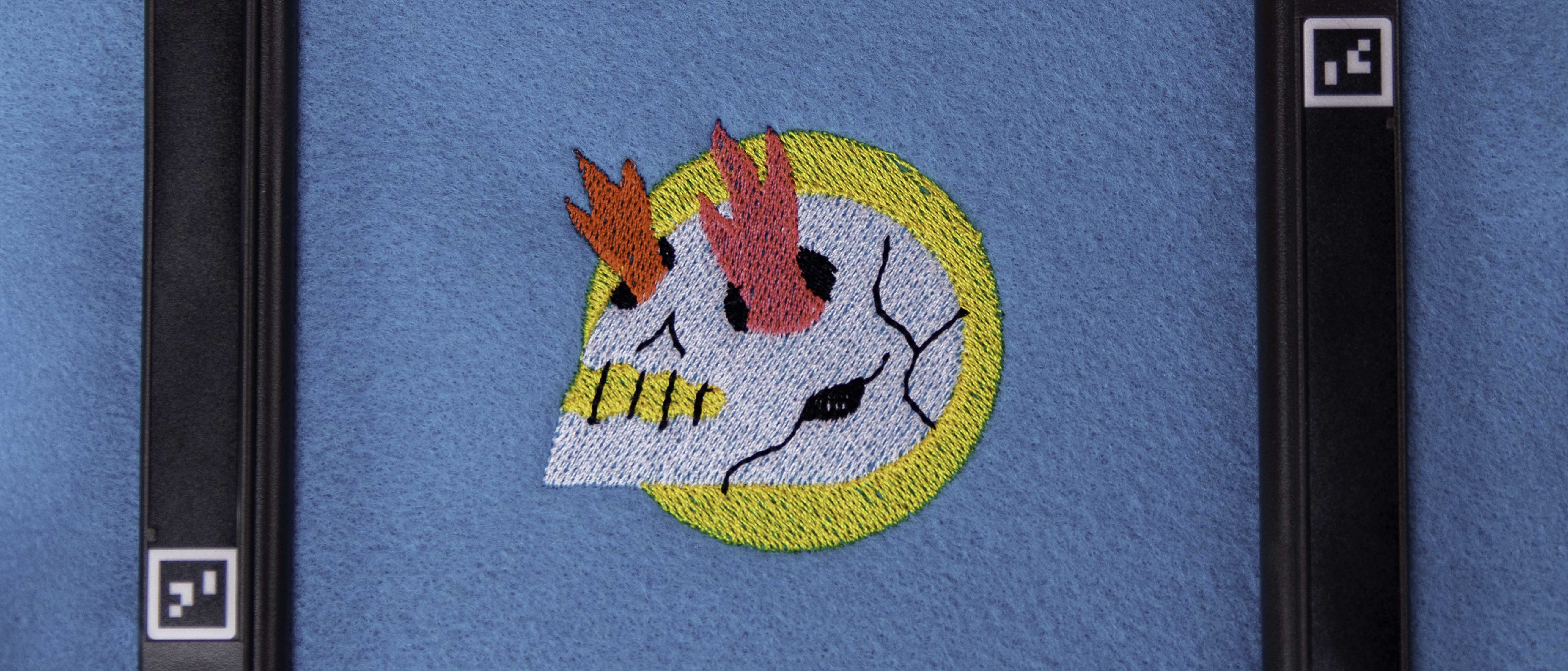 Colourful shot of Brother's Skitch machine with bright cartoon illustrations.