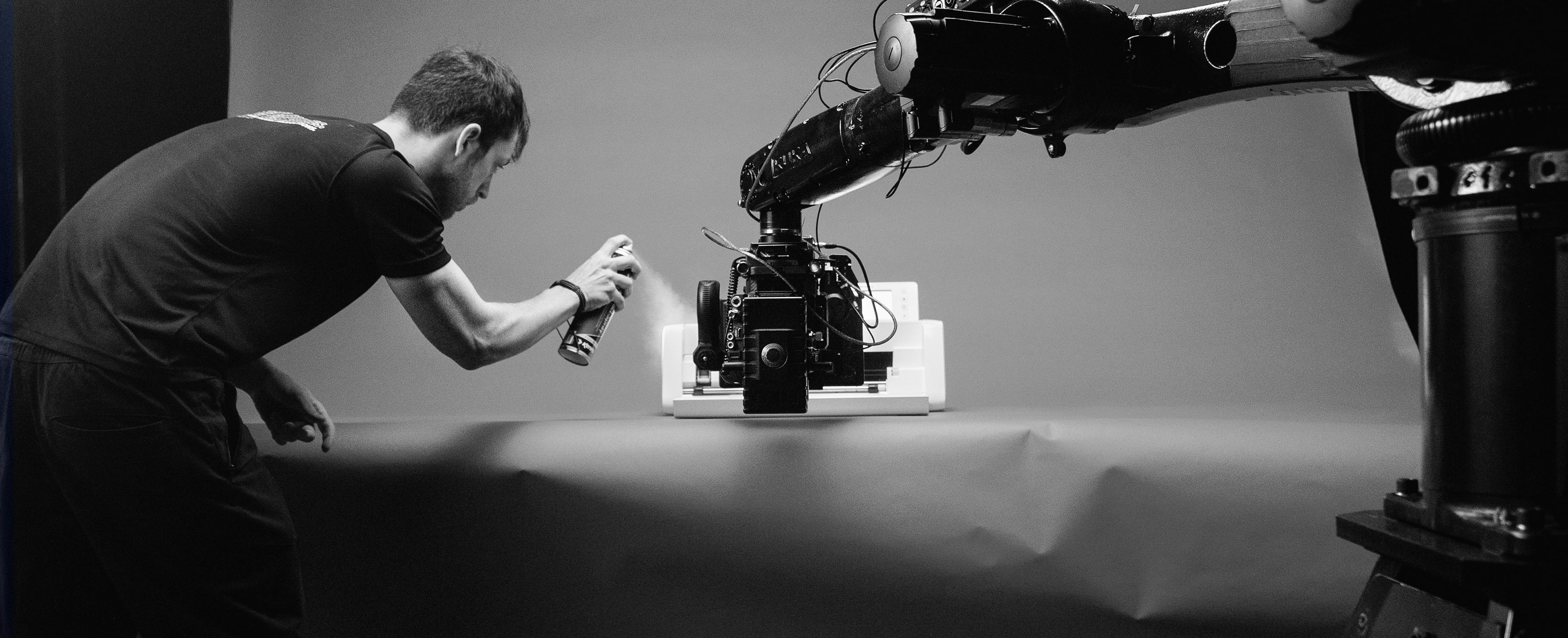 Behind-the-scenes of shoot for Brother. Photo of studio and robot arm/Cinebot being used to capture smooth, dynamic shots of the machine.