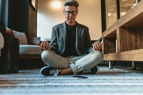 A man praacticing mindfulness in his office