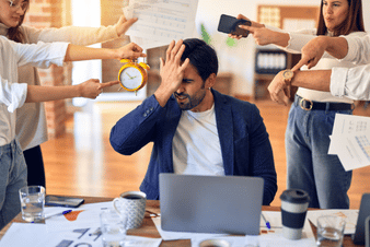A stressful office enviornment with a lot of pressure and demands, setting the scene for burnout