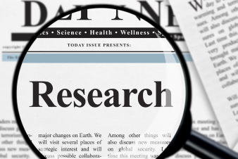 A magazine cut out of a reserach paper highlighting the link between research and mindfulness