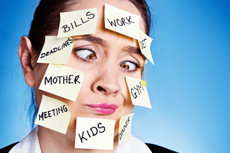 A person with sticky notes covering their face with words like "Bills", "Work", "Deadlines", "Mother", "Meeting", "Kids", "Gym", and "Dinner" written on them, conveying a sense of being overwhelmed.