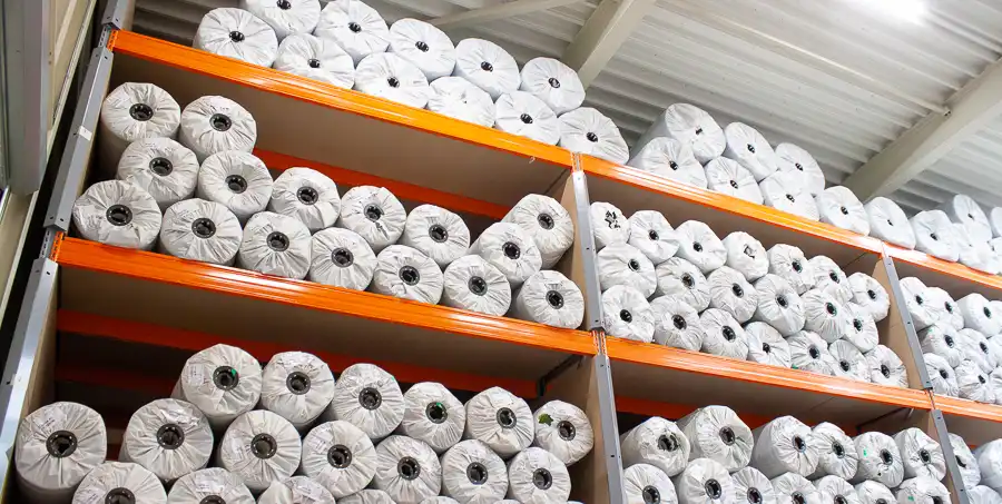Warehouse with rolls of artificial grass