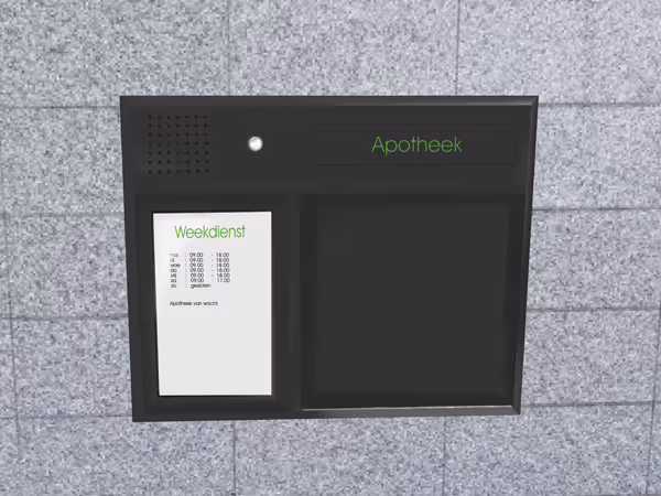 Un guichet noir intégré dans un mur gris.